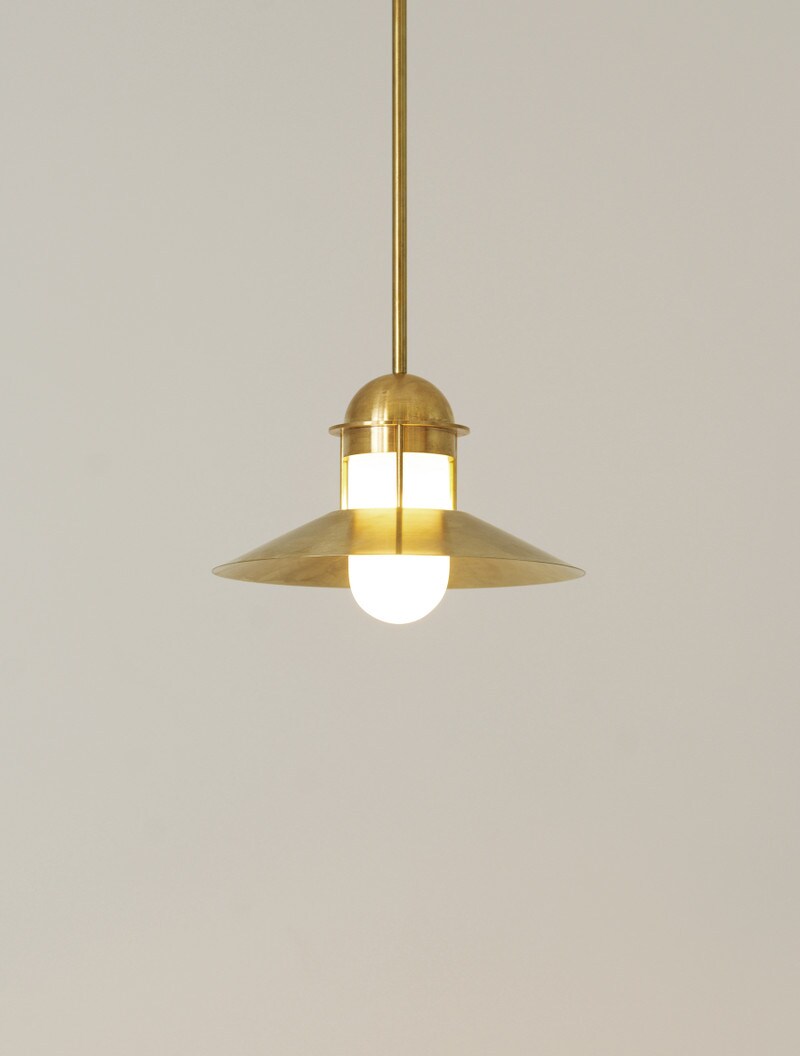 Harbor 12 Pendant shown in Raw Brass